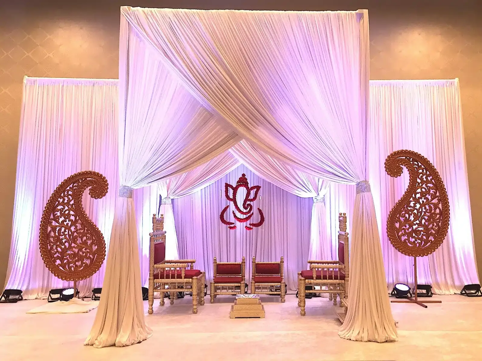 Simple white fabric mandap for clean modern Indian wedding