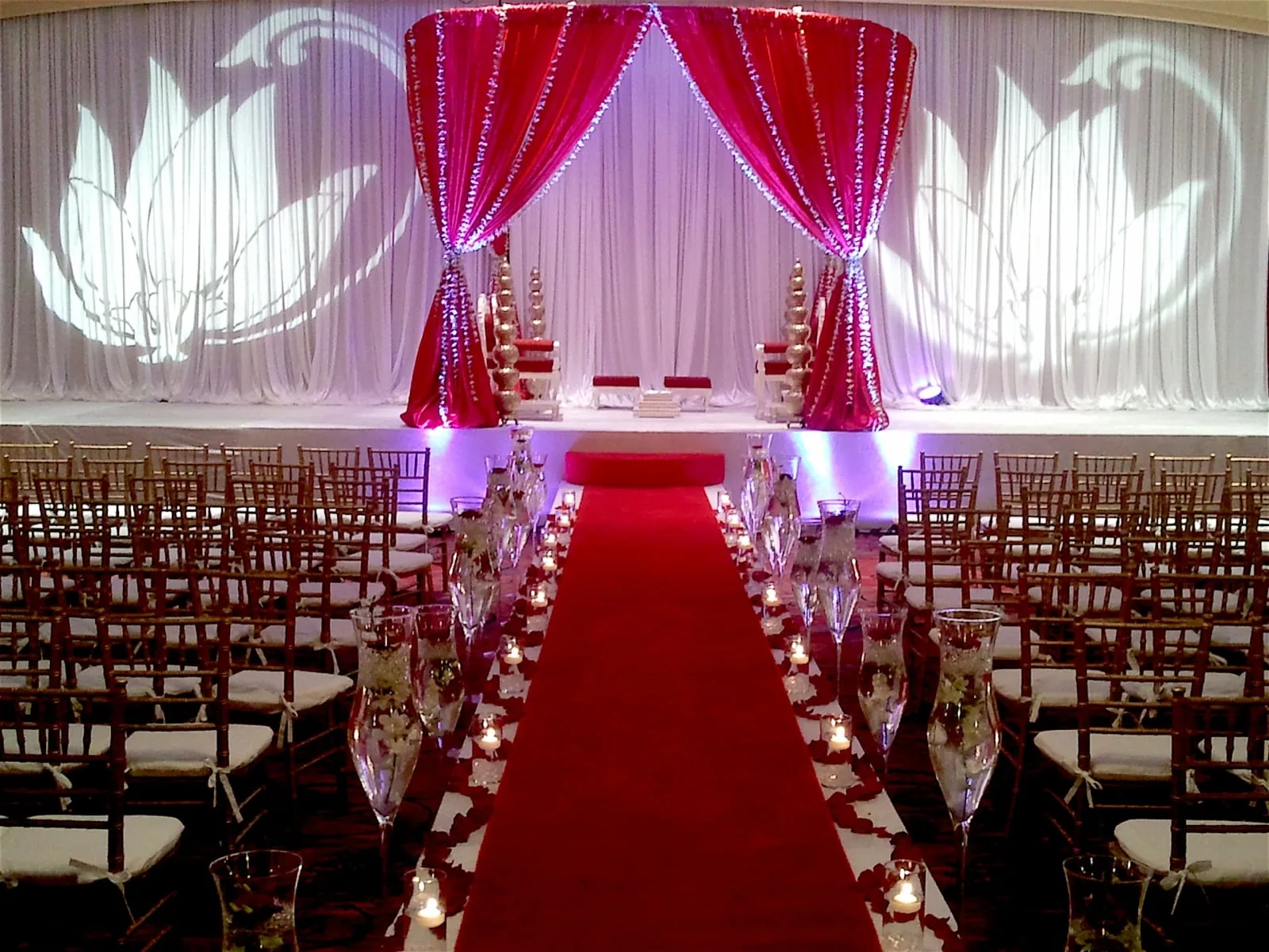 Fabric mandap with red draping for traditional Hindu wedding