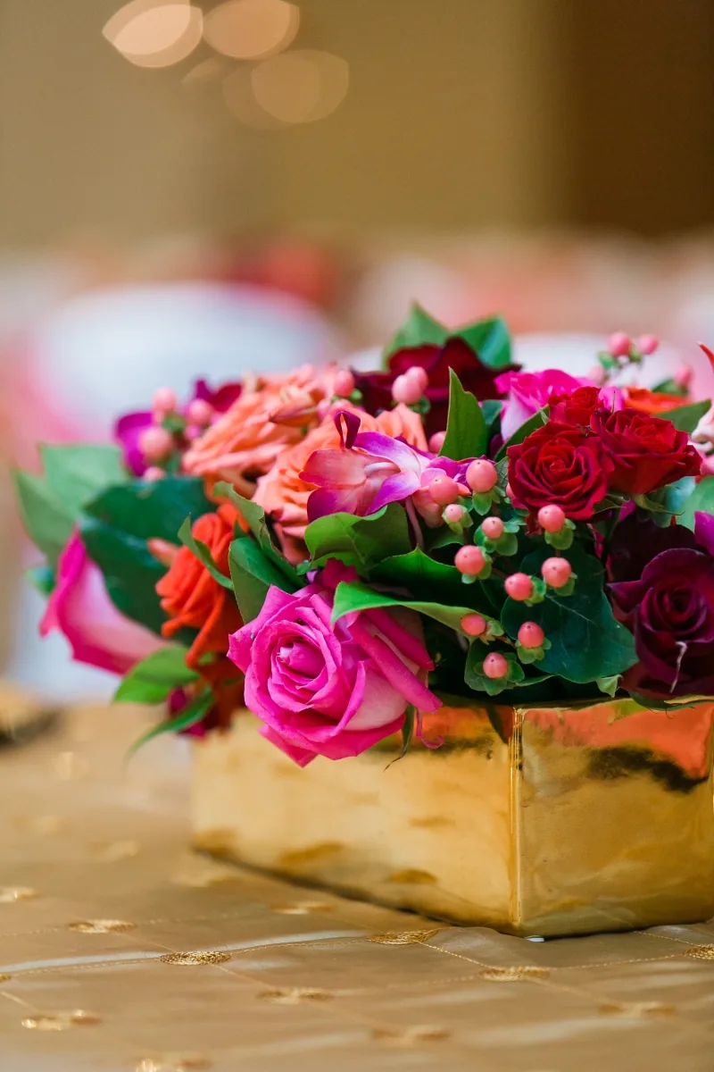 Bold pink and red Indian wedding reception decor, Chicagoland